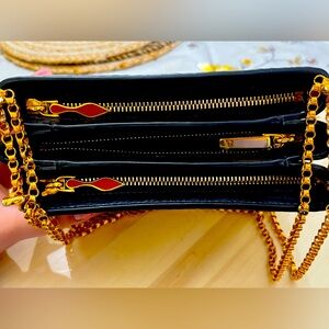 Christian Louboutin gold purse